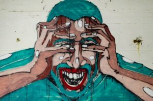 medication for migraines - painting of man with headache